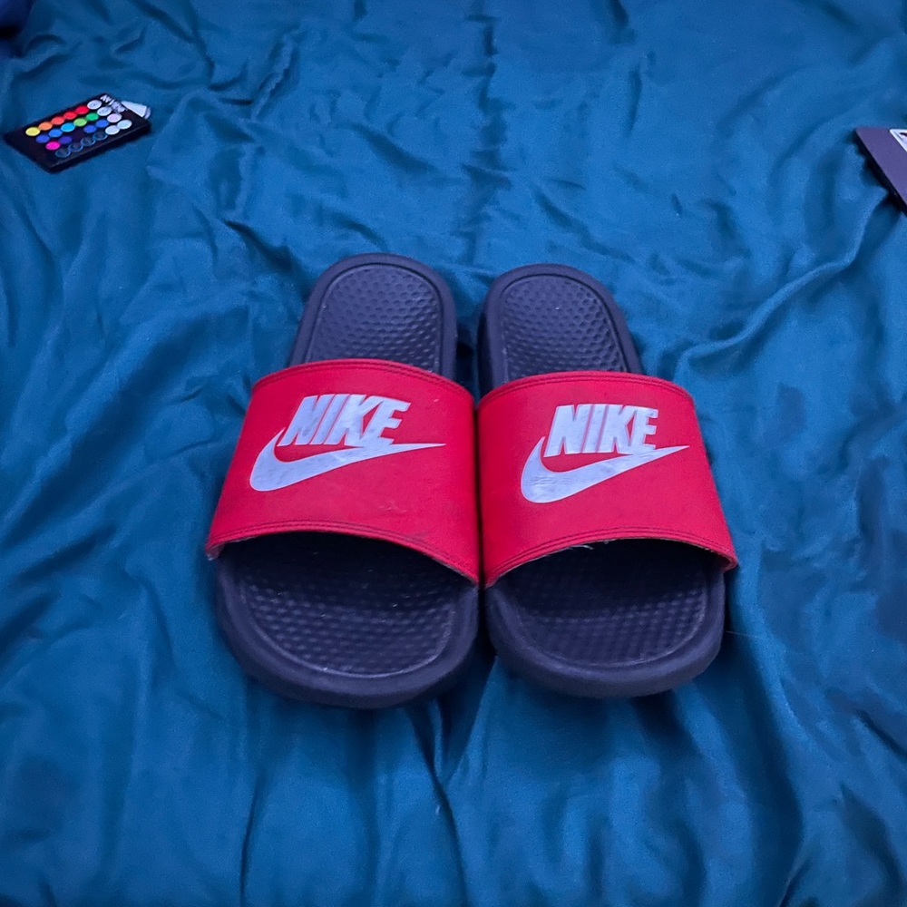 RED AND BLACK NIKE SLIDES